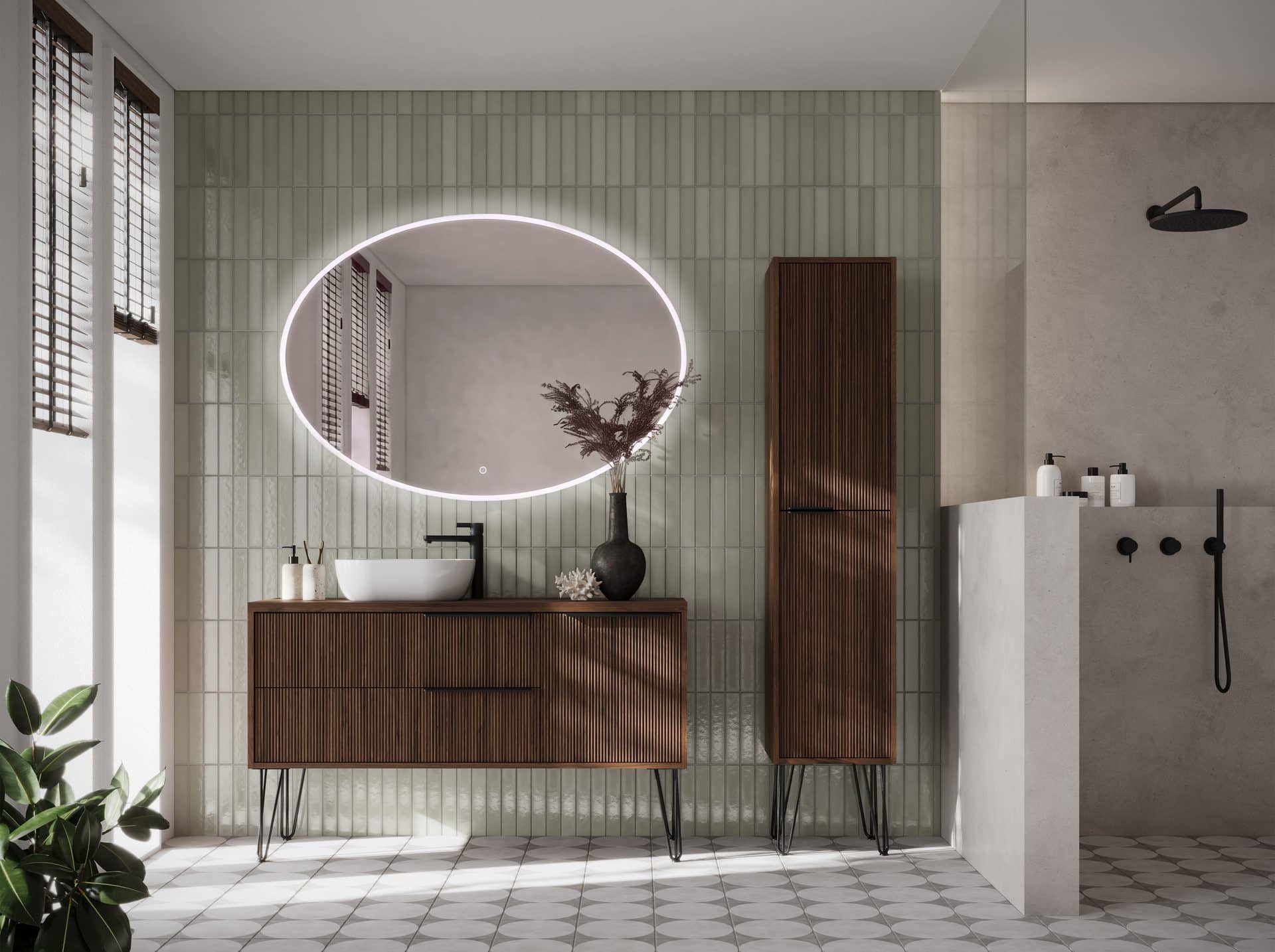 Badkamer met donker eiken badmeubel, ovale spiegel met verlichting en groene staande wandtegels